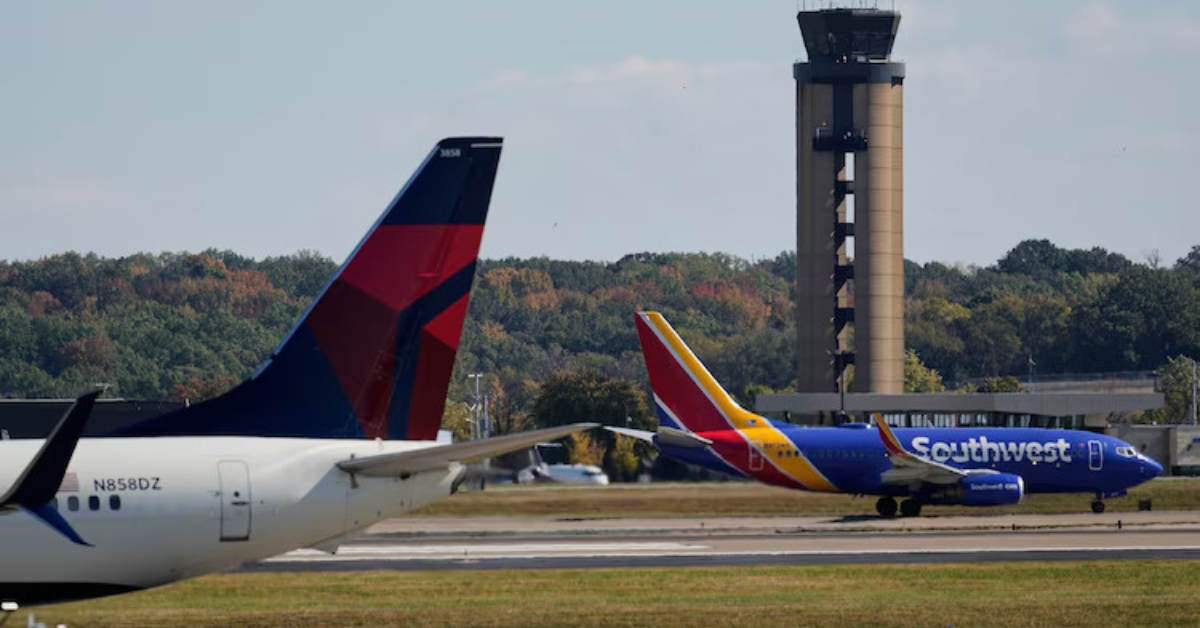 View of planes grounded at a U.S. airport during air traffic capacity cuts announced by the FAA.